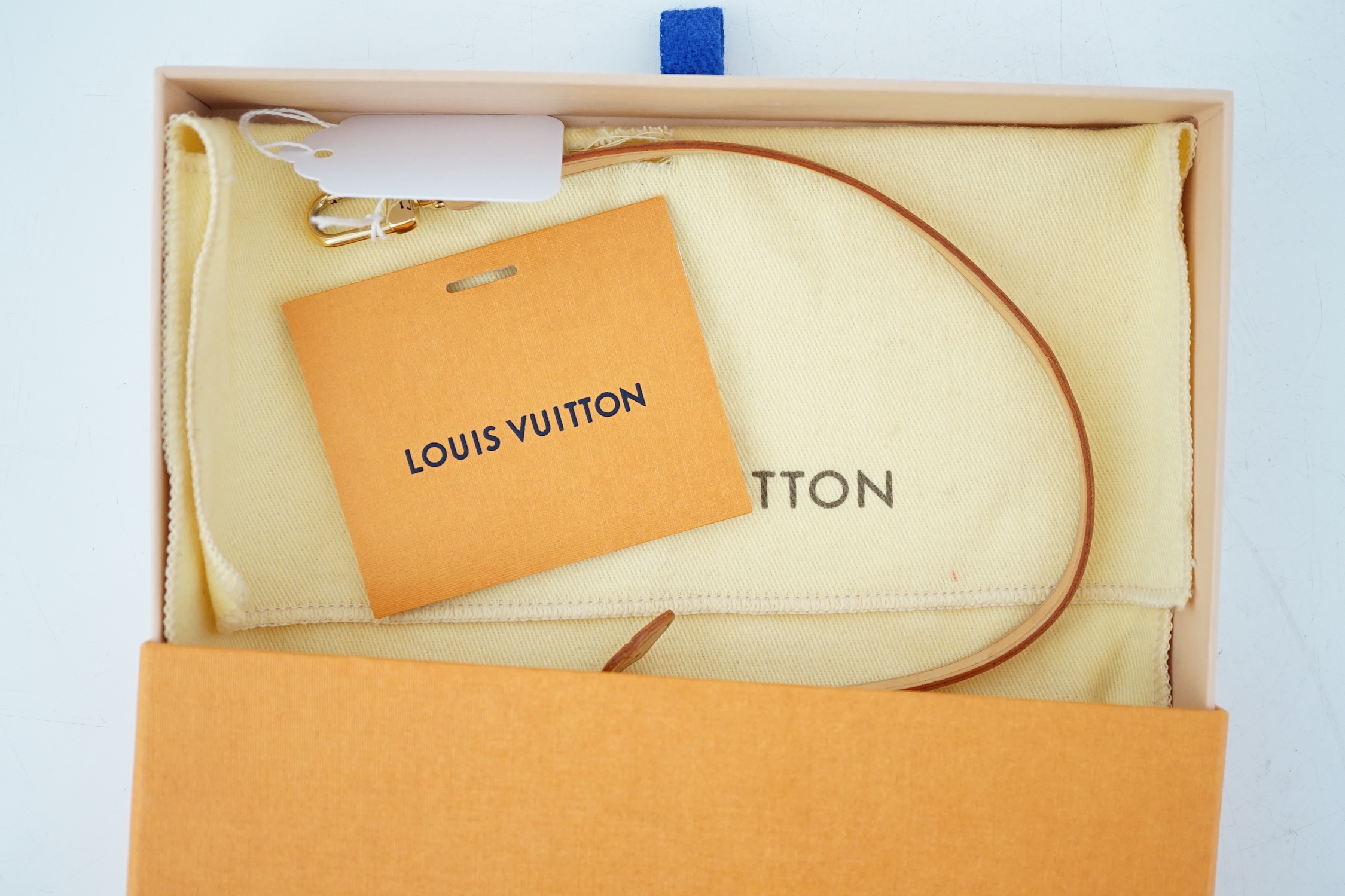 A Louis Vuitton white check mini handbag, height 10cm, width 15cm